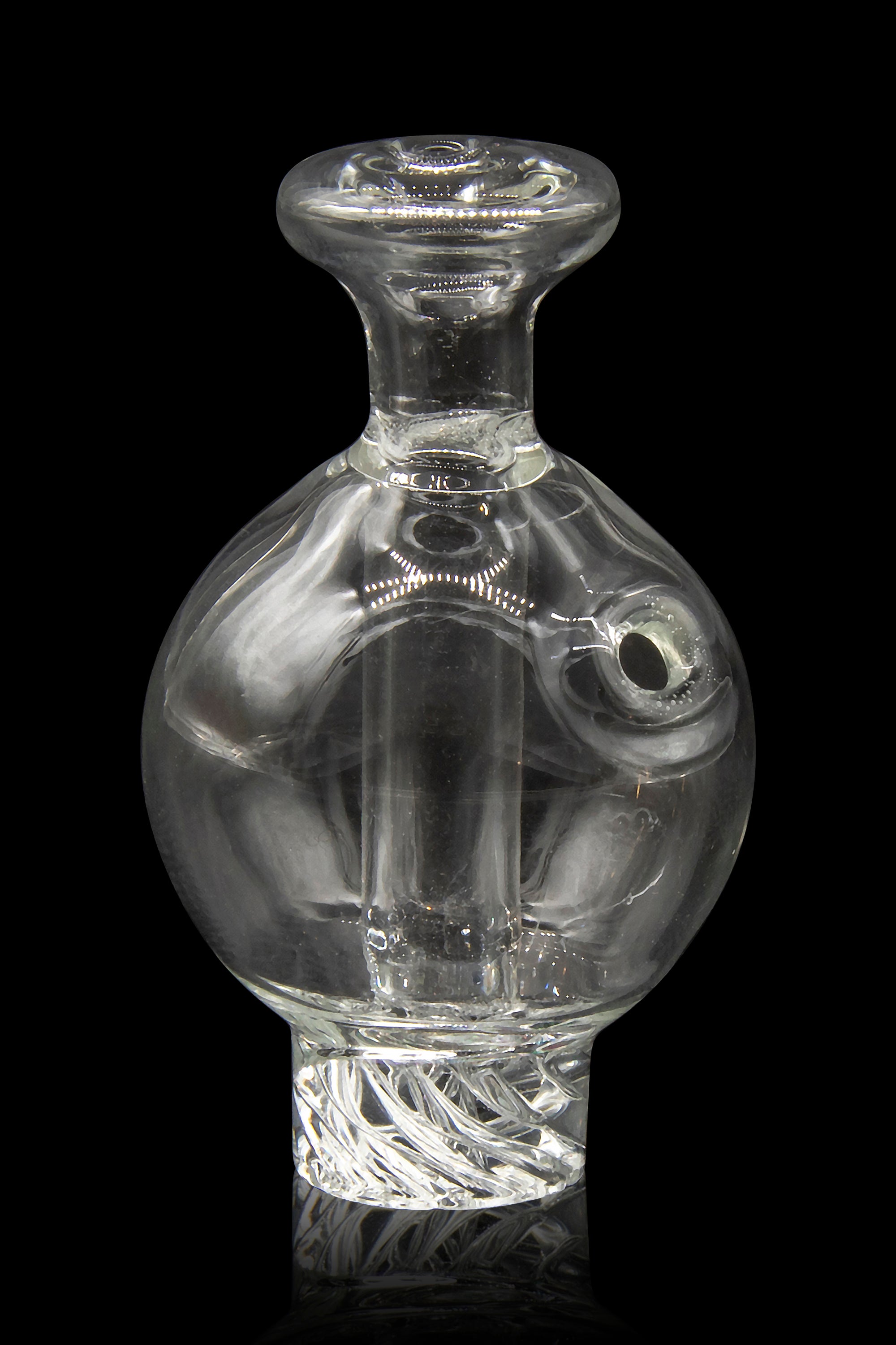 Clear glass cannabis concentrate dome with intricate internal designs.