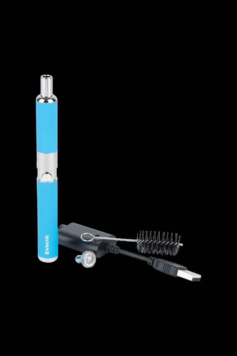 Studio-lit front view of a blue Yocan Evolve-D Dry Herb Vaporizer Pen standing beside its USB charger and cleaning brush on black background