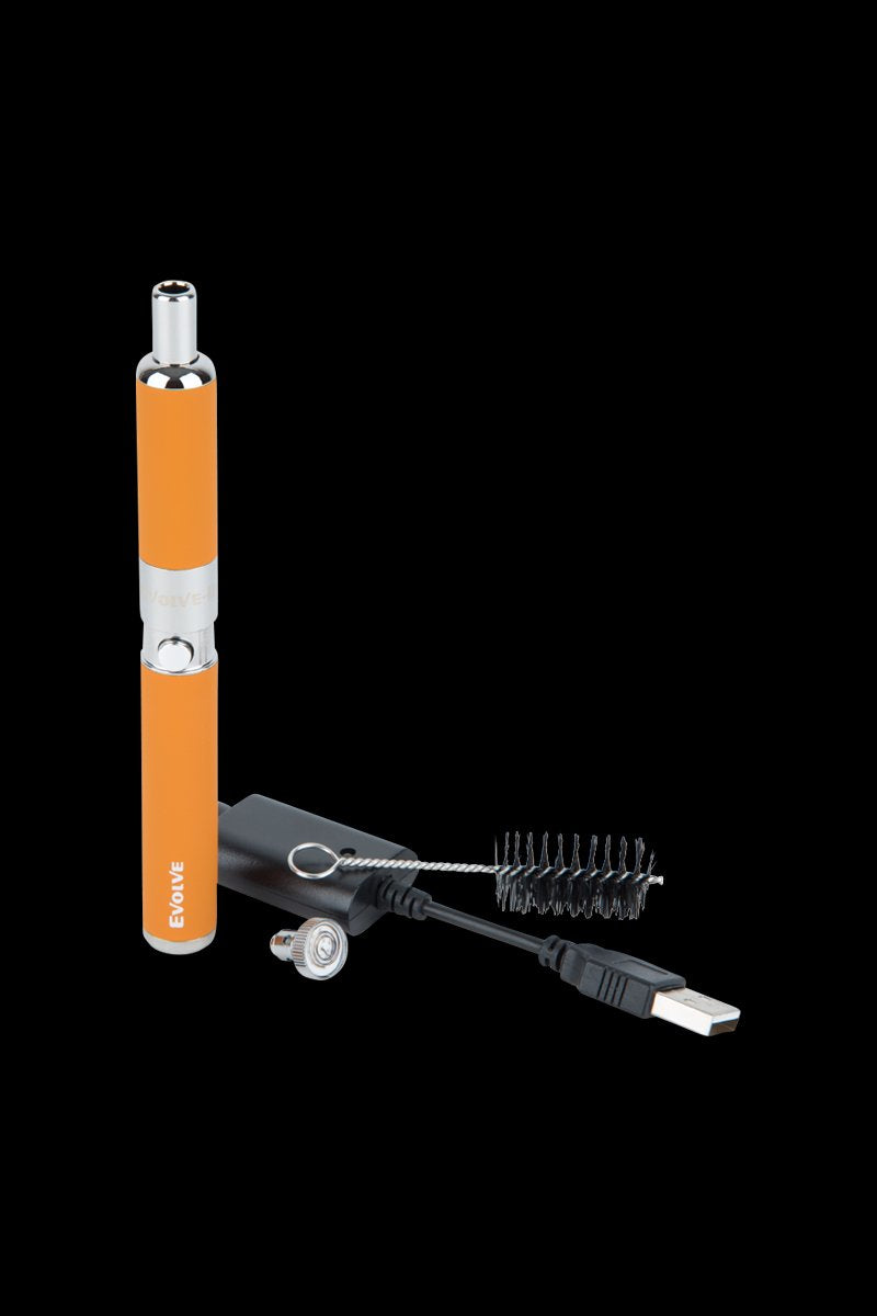 Tall front view of the red Yocan Evolve-D Dry Herb Vaporizer Pen standing next to its USB charger, mouthpiece and cleaning brush on black background