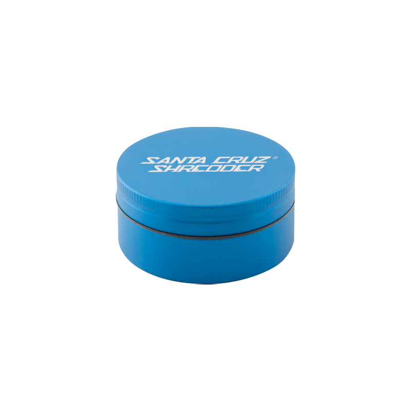 Centered, front-angle shot of a blue Santa Cruz Shredder 2-Piece Grinder showing its round stacked halves and white logo on the lid