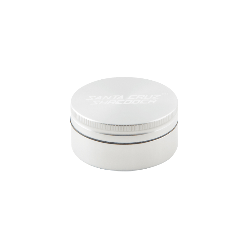 Top-down view of a small purple Santa Cruz Shredder 2-Piece Grinder with its lid showing the embossed logo and subtle rim shadowing.