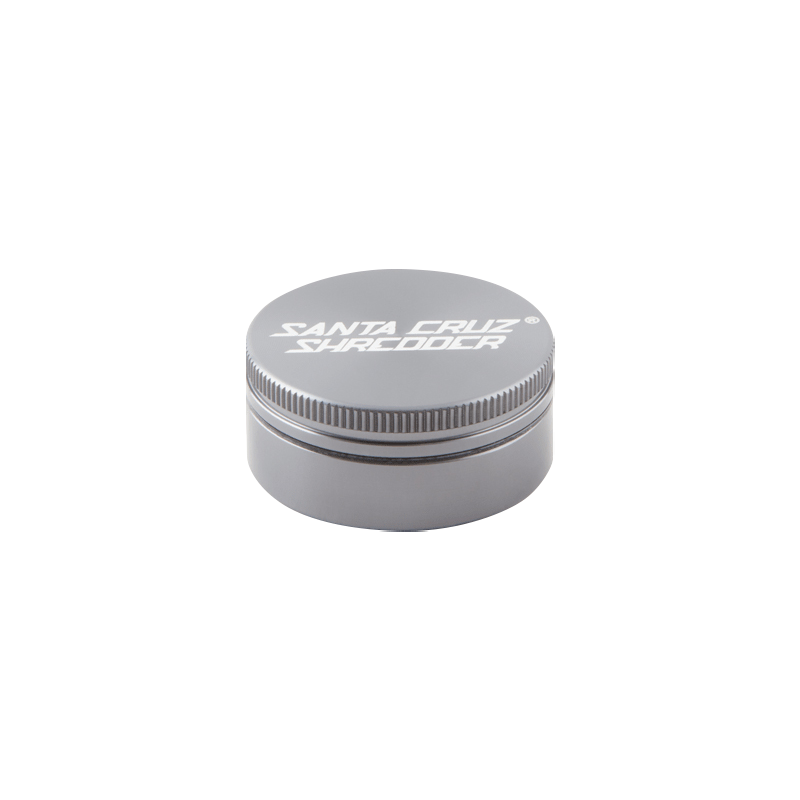 Top-down view of a green Santa Cruz Shredder 2-Piece Grinder on a white background showing the ribbed lid edge and white logo.
