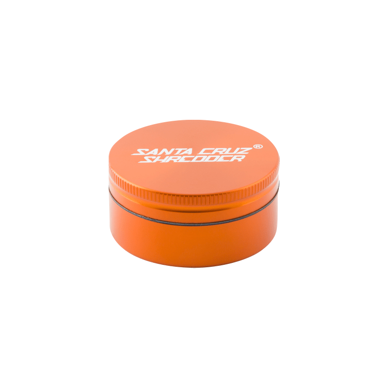 Top-down view of an orange Santa Cruz Shredder 2-Piece Grinder with white logo centered on the lid and subtle shadow beneath.