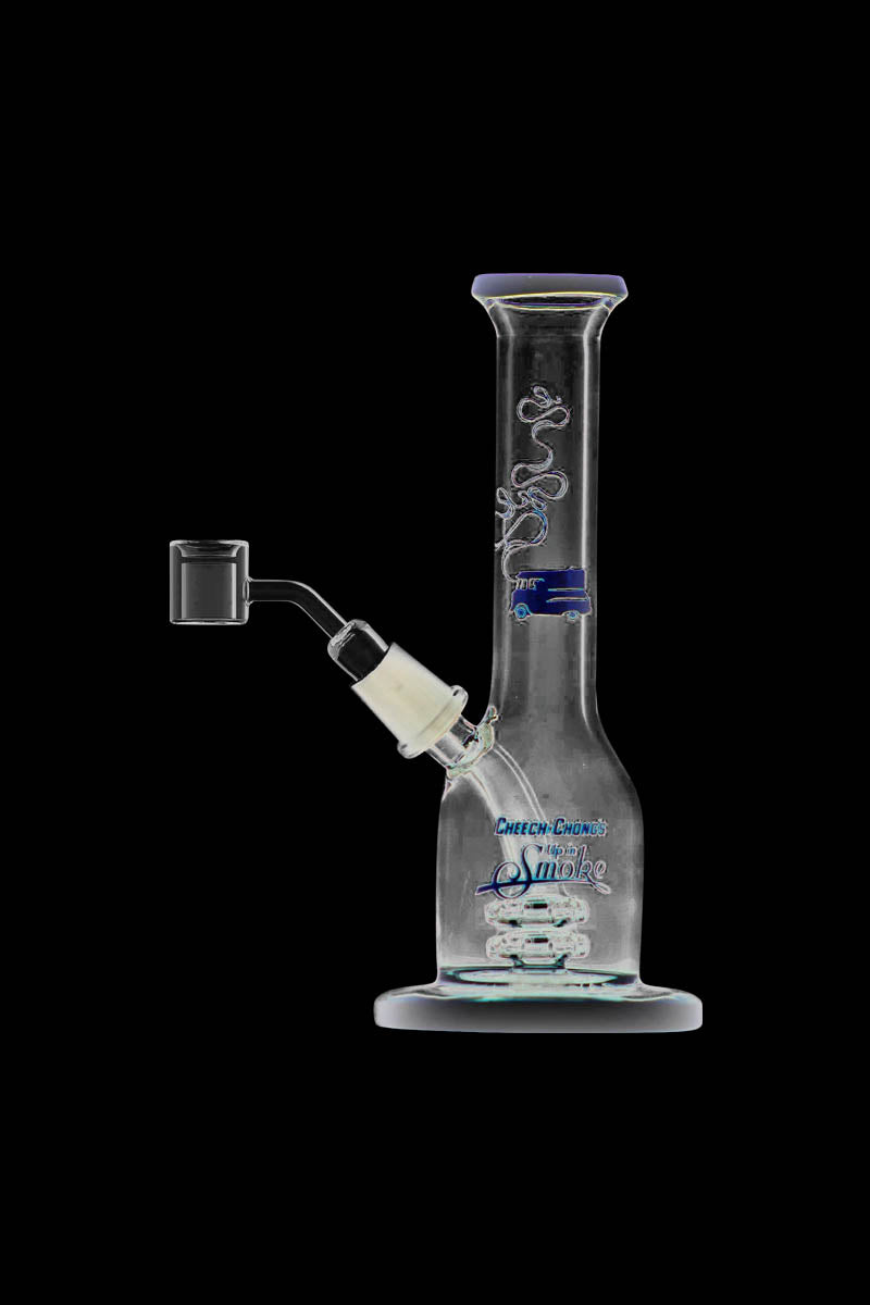 A studio shot of the Cheech & Chong "Jade East" Mini Rig Dabber, displaying its compact size and sleek design from a slightly angled perspective.