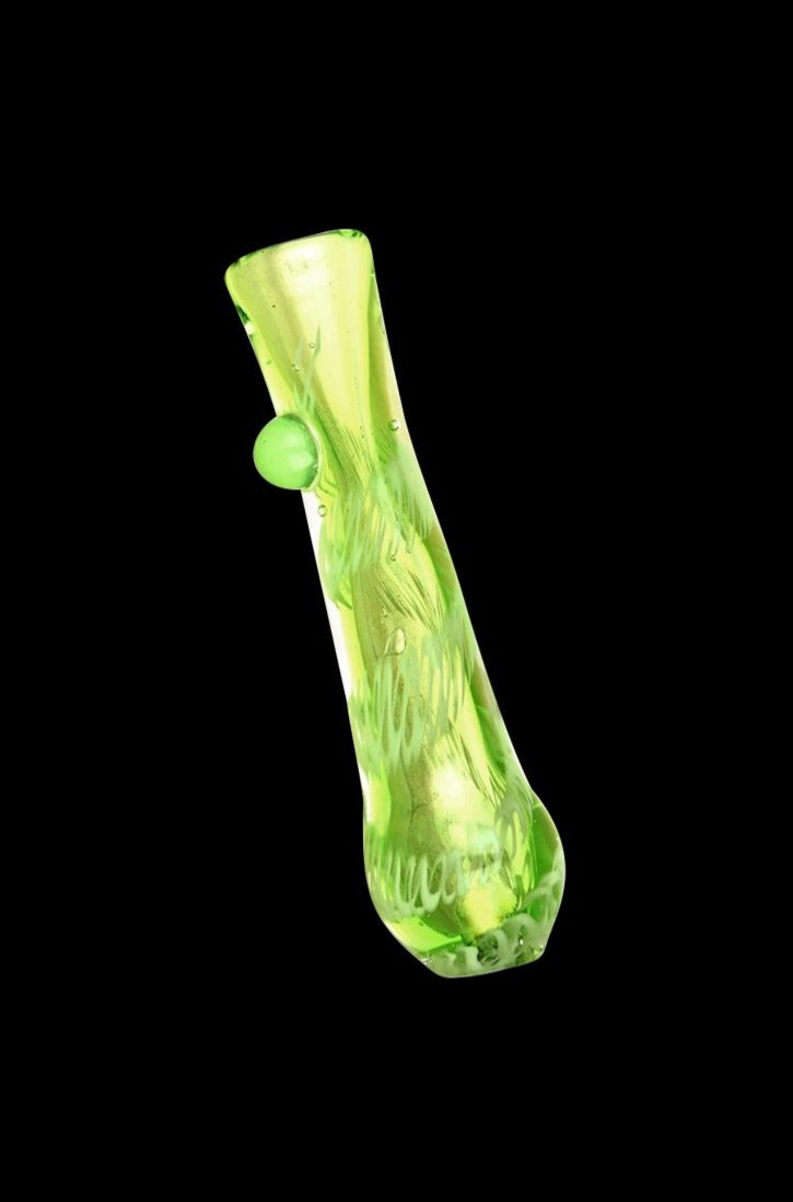 Angled close-up of an acid green worked glass taster chillum showing swirled lime patterns and a single glass nub against a black background, Acid Green Worked Glass Taster Chillum