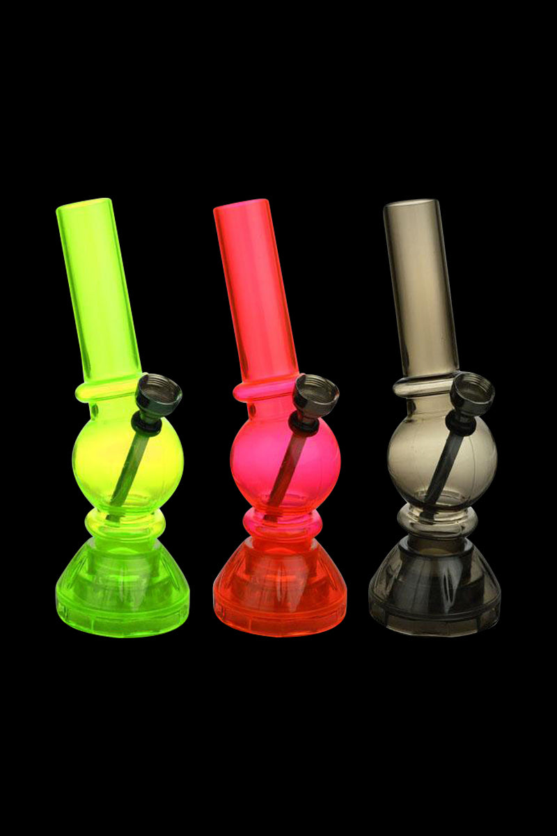 A front view of the Angled Mini Acrylic Water Pipe with Grinder Base, showing three colorful pipes arranged on a black background.