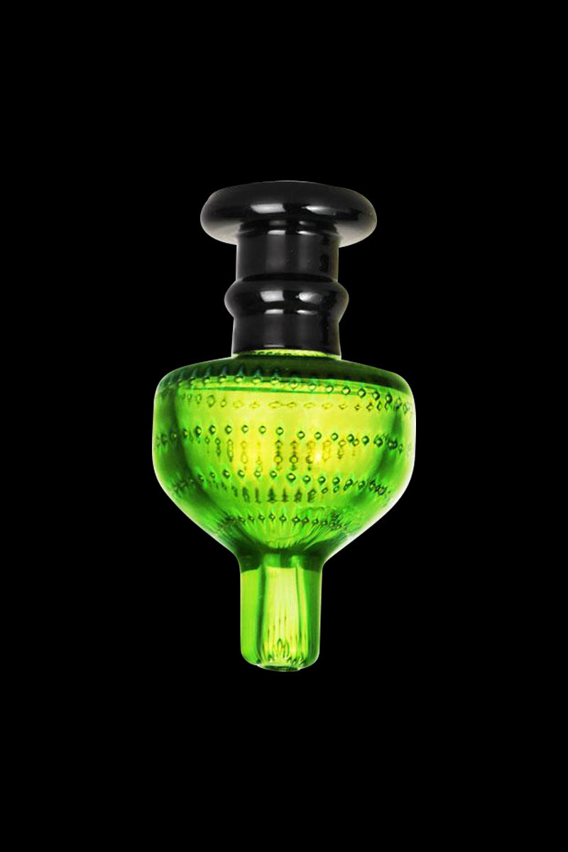 A studio shot of the Antique Lamp Bullet Style Carb Cap, showcasing its dark, rounded shape against a plain black background.