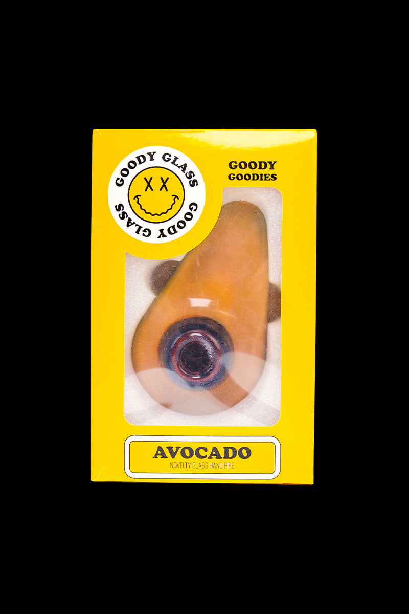 Centered front view of the Goody Avocado Hand Pipe in its yellow windowed box showing the avocado-shaped glass piece.