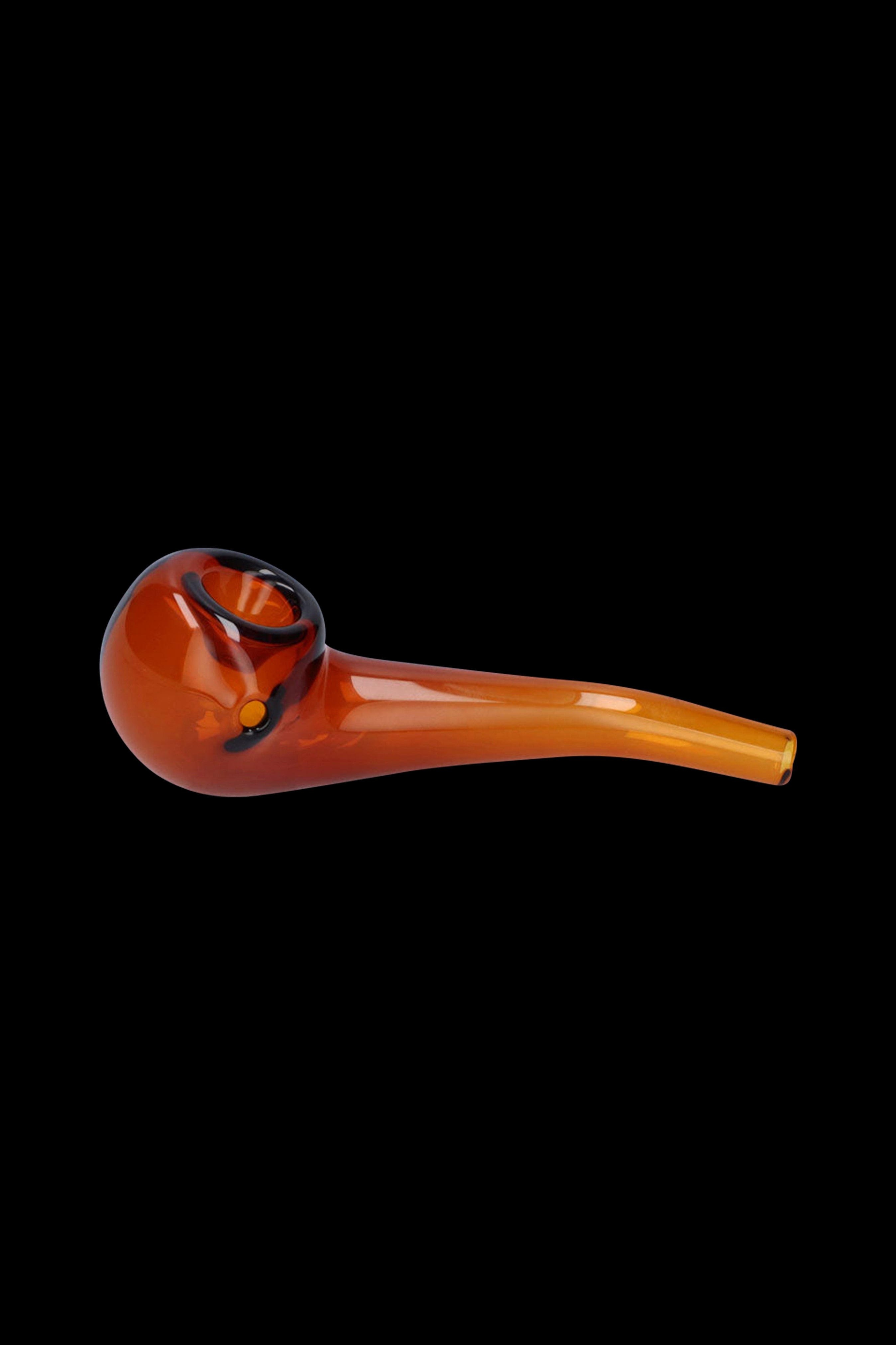 Amber glass pipe with a curved stem, isolated on a black background.