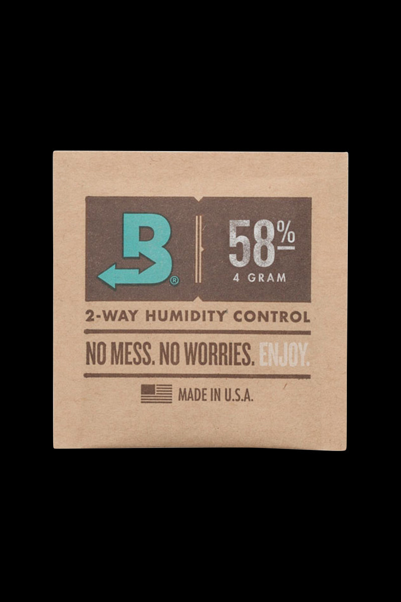 Close-up of the Boveda Humidity Control Pack for Dry Herbs - 58%, displaying its branding and percentage label against a neutral background.