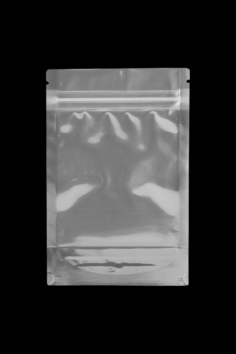 Centered front view of a clear resealable pouch on a black background showing the Cannaline Smell Proof Bags X Small with a zip-lock top and glossy reflections.