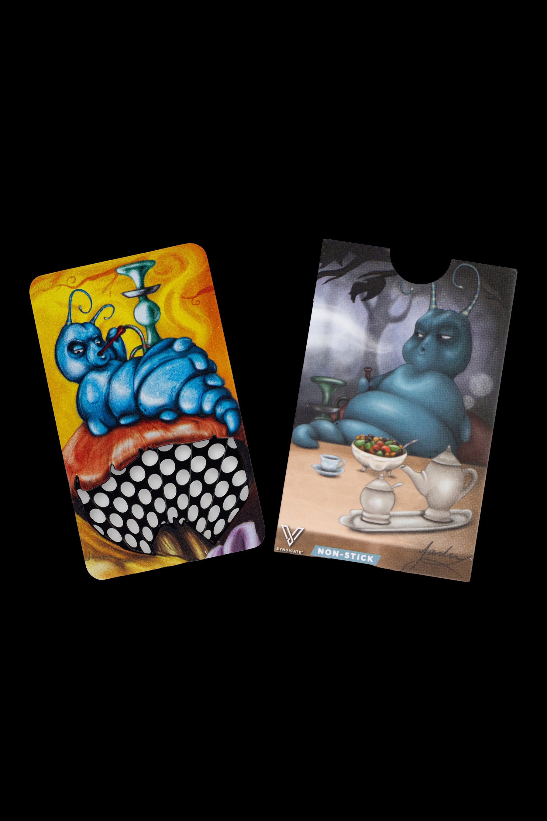 Two silicone mats featuring whimsical, blue caterpillar artwork inspired by Alice in Wonderland, designed for use with cannabis accessories. One mat depicts the caterpillar on a checkered pedestal, the other within a tea party setting, both labeled “NON-STICK”.