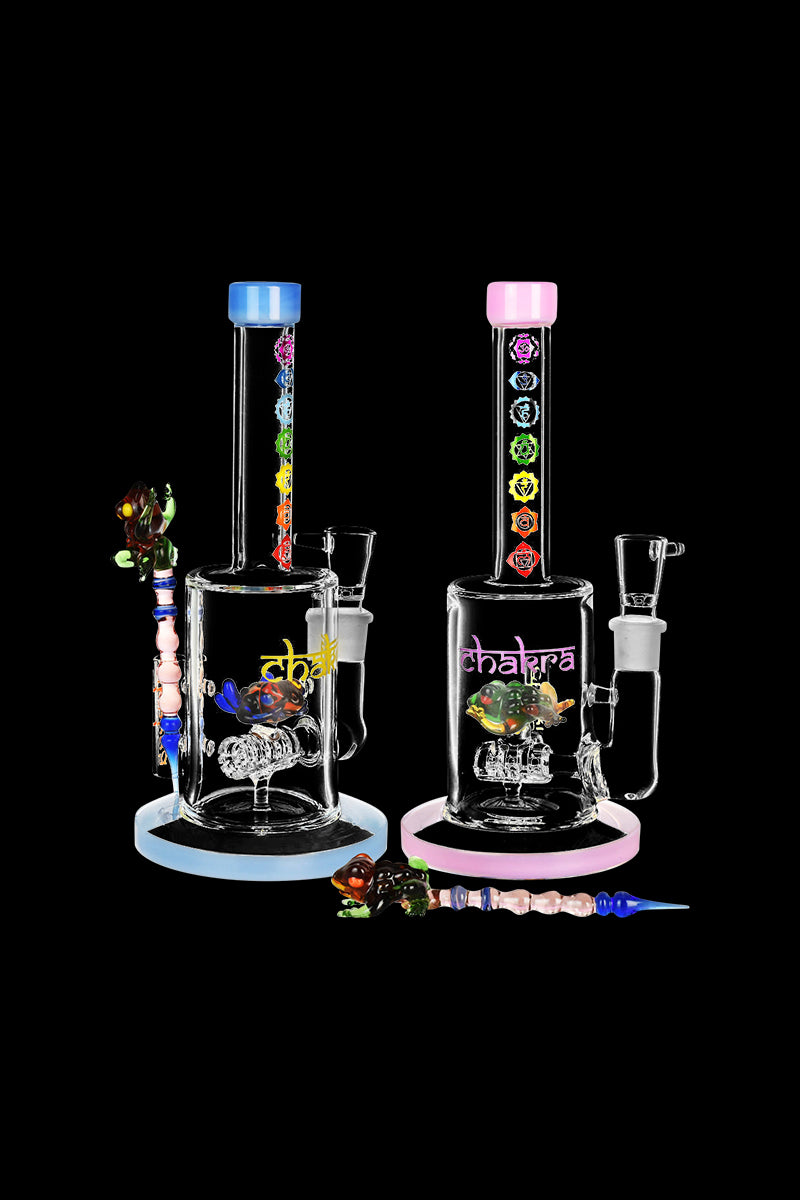 Front view of the Chakra Frog Water Pipe with Stir Tool, displaying a clear glass pipe with a frog design and accompanying stir tool.