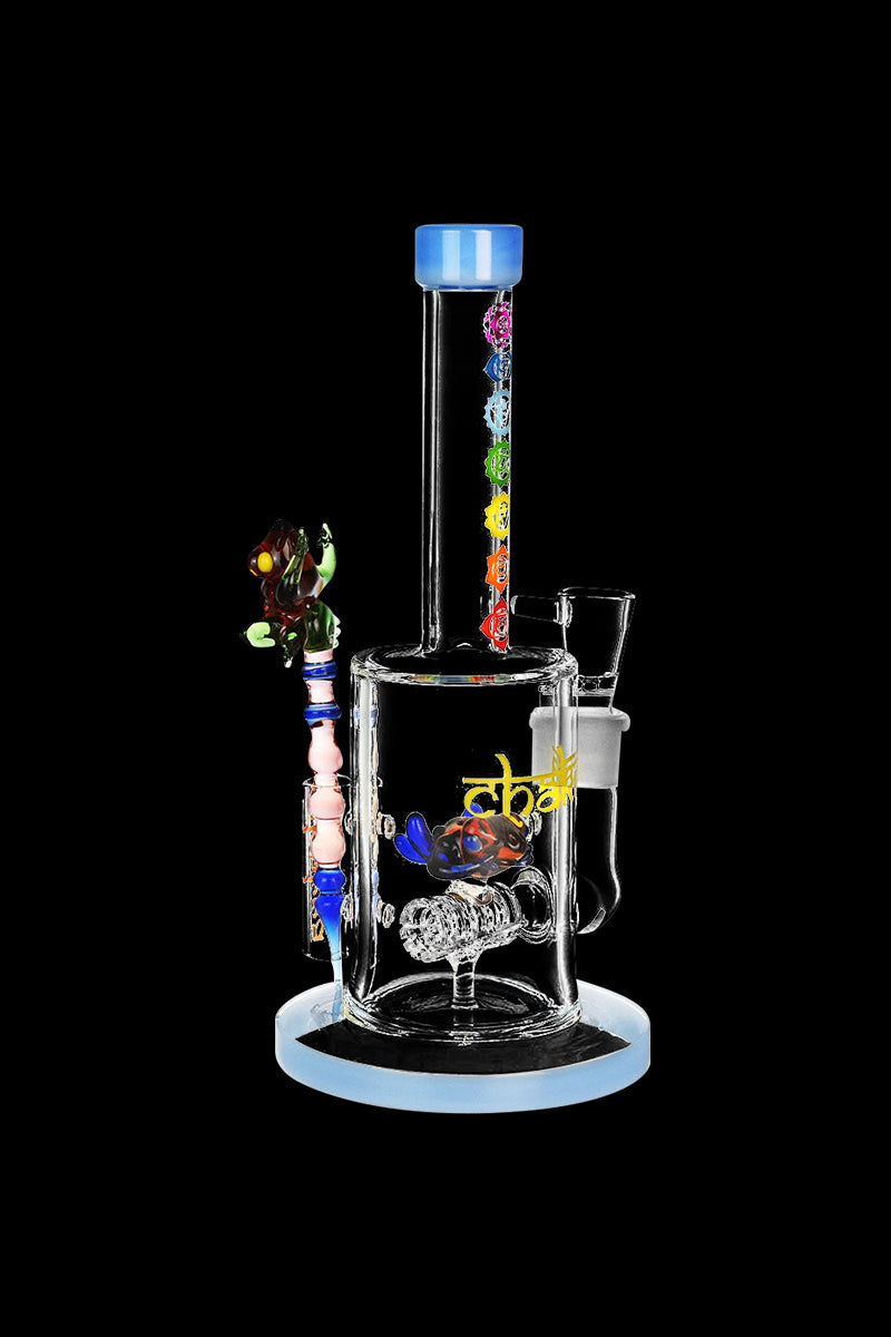 A front view of the Chakra Frog Water Pipe with Stir Tool, showing a clear glass pipe with colorful accents and a frog-shaped base.