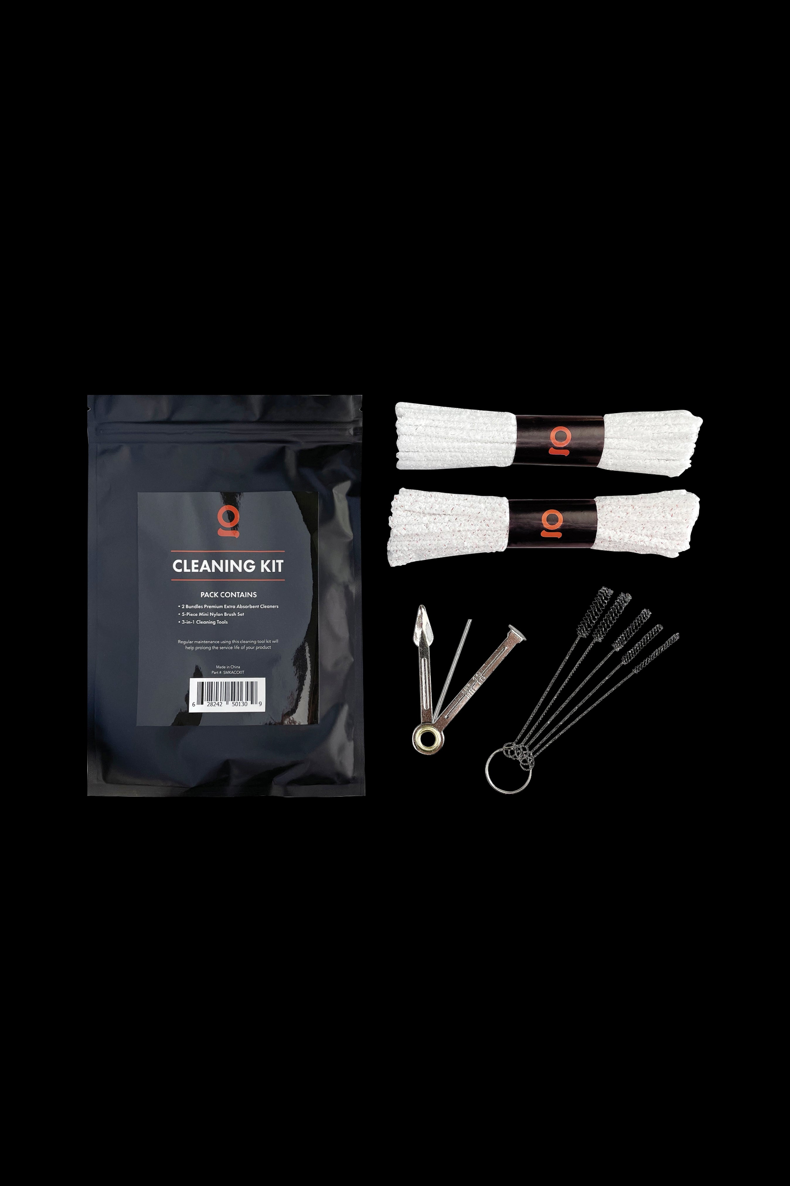 Cannabis cleaning kit with cleaning solution, swabs, and brushes laid out on a black surface.