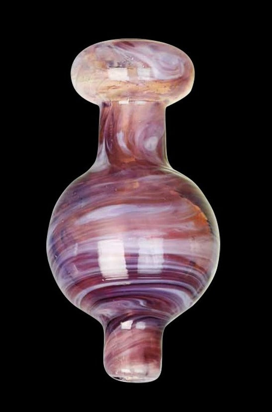 Close-up front view of the Cloudy Swirl Ball Carb Cap showing purple and amber glass swirls against a black background.