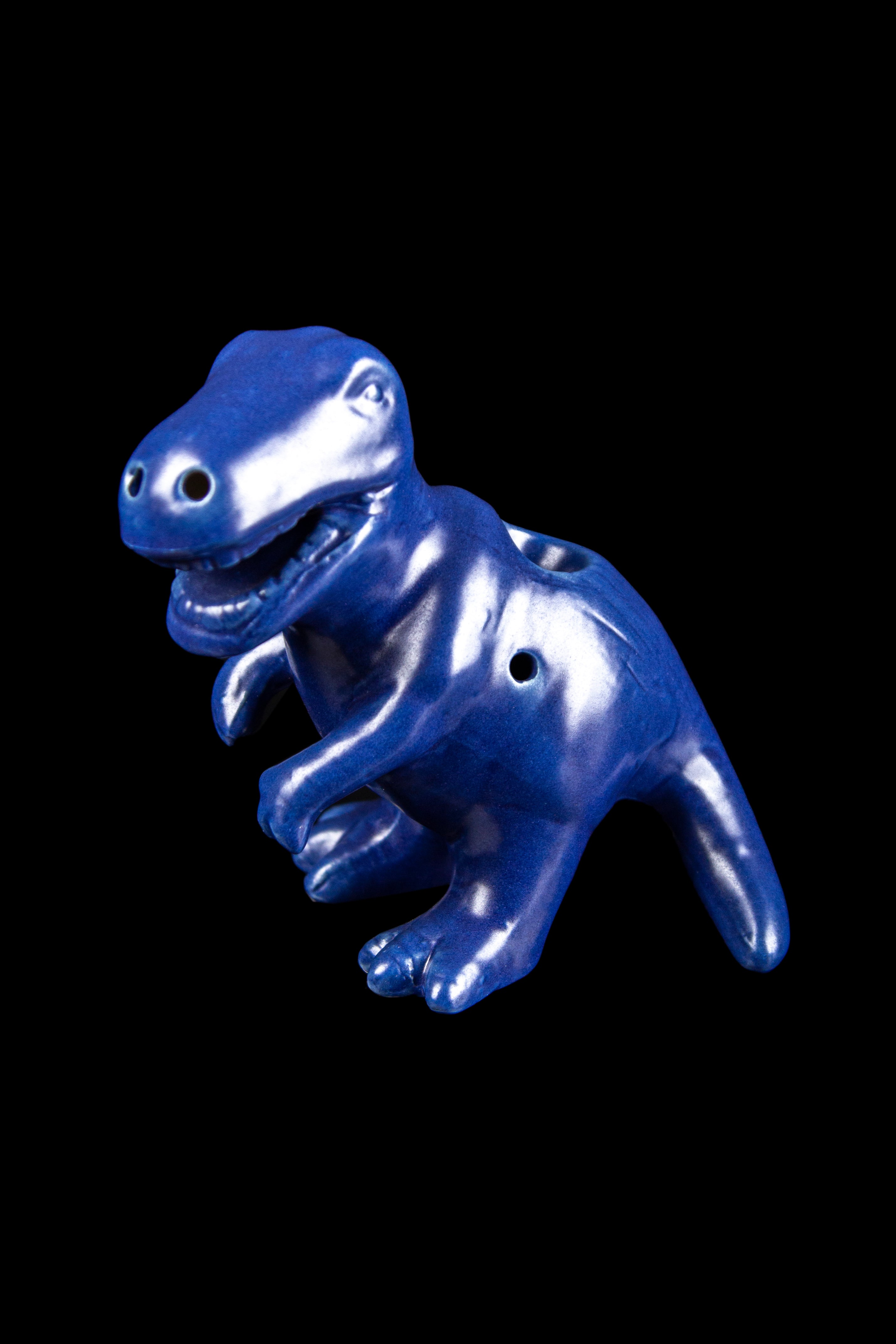 Blue T-Rex shaped glass piece for smoking.