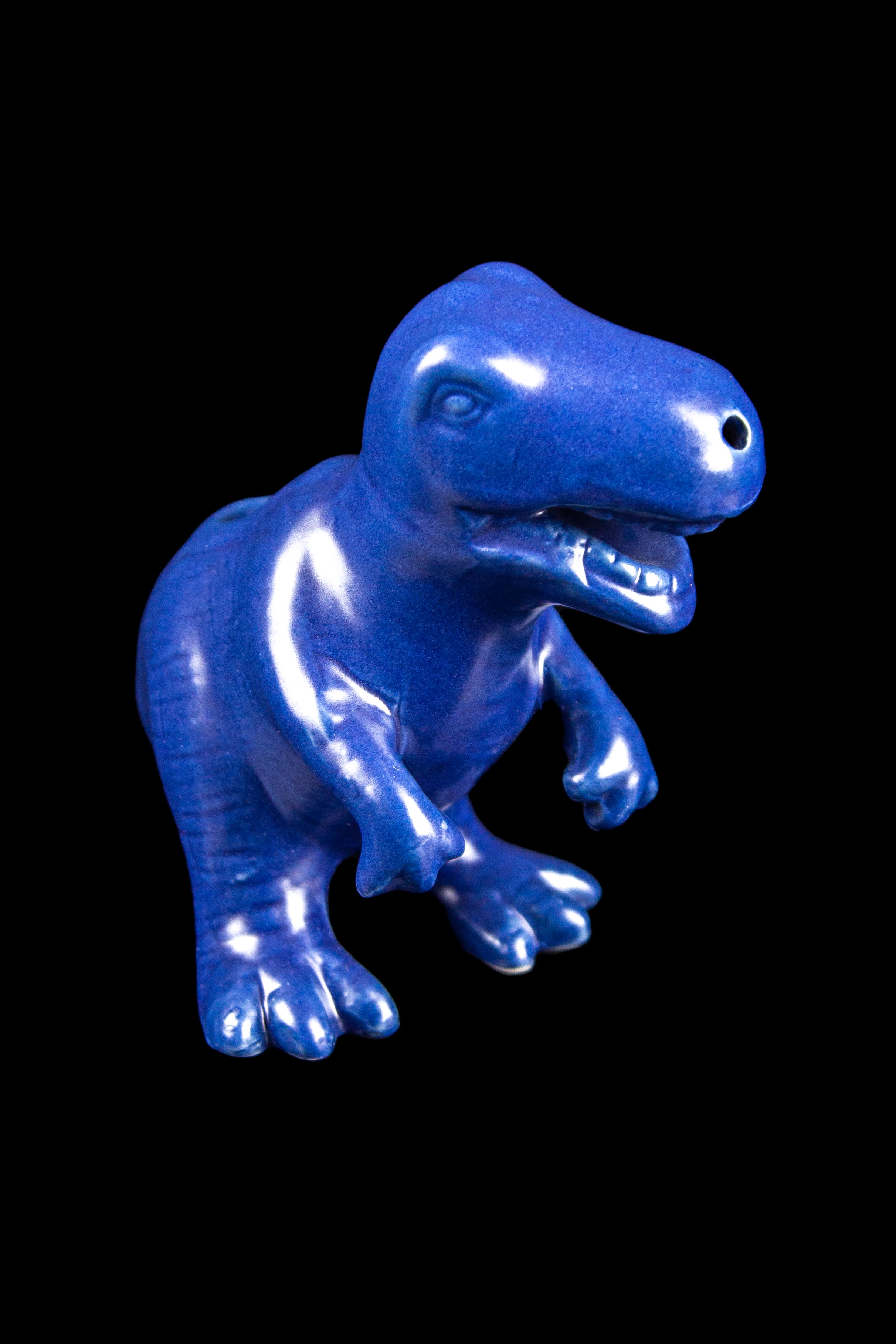 Blue T-Rex cannabis accessory.