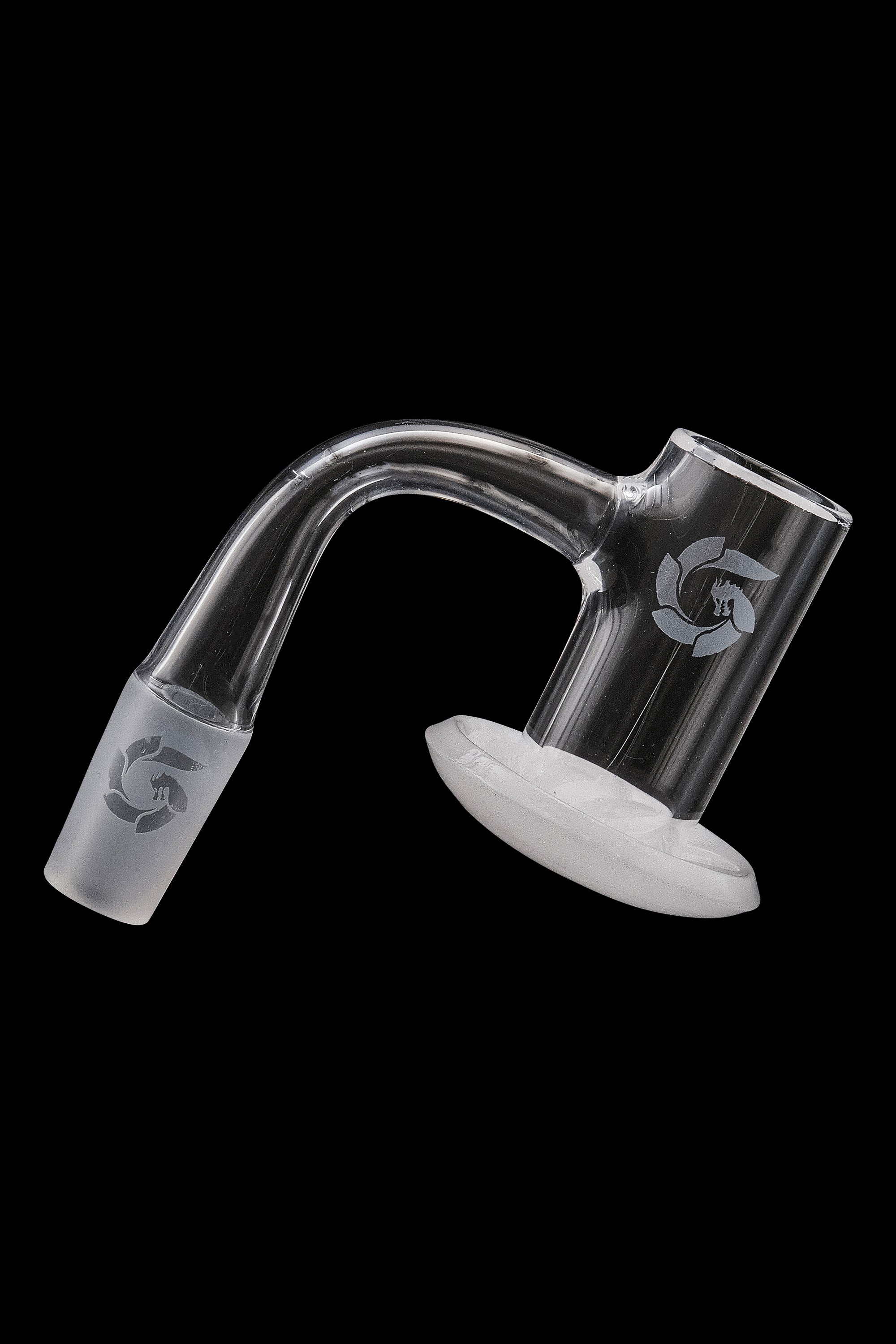 Clear quartz dab rig insert with etched logo, isolated on black.