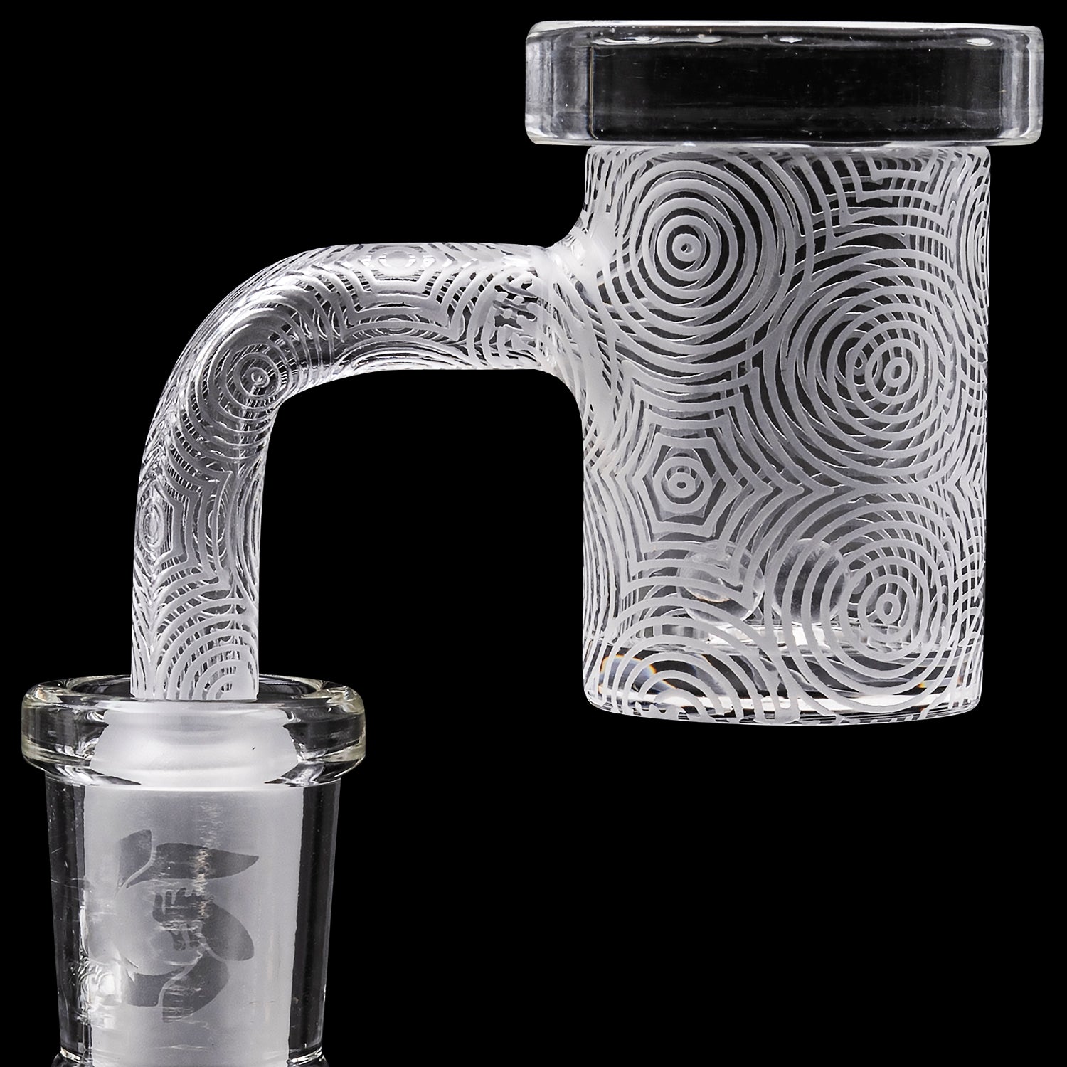Clear glass cannabis water pipe with intricate spiral etching.