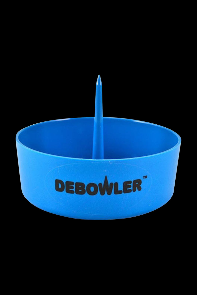 Front-facing shot of the gray Debowler Ashtray in bright blue plastic with its central spike and logo visible against a black background