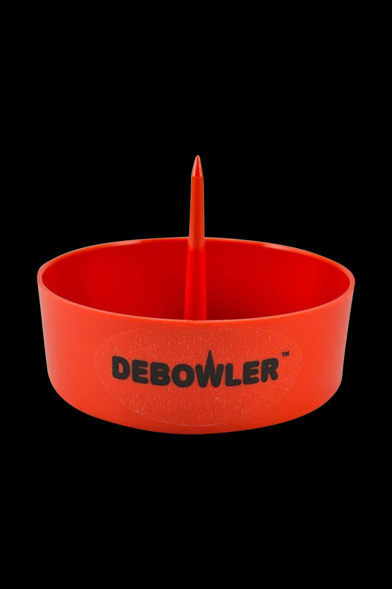 Front-facing shot of the red Debowler Ashtray bowl with a central spike and the DEBOWLER logo on a black background.