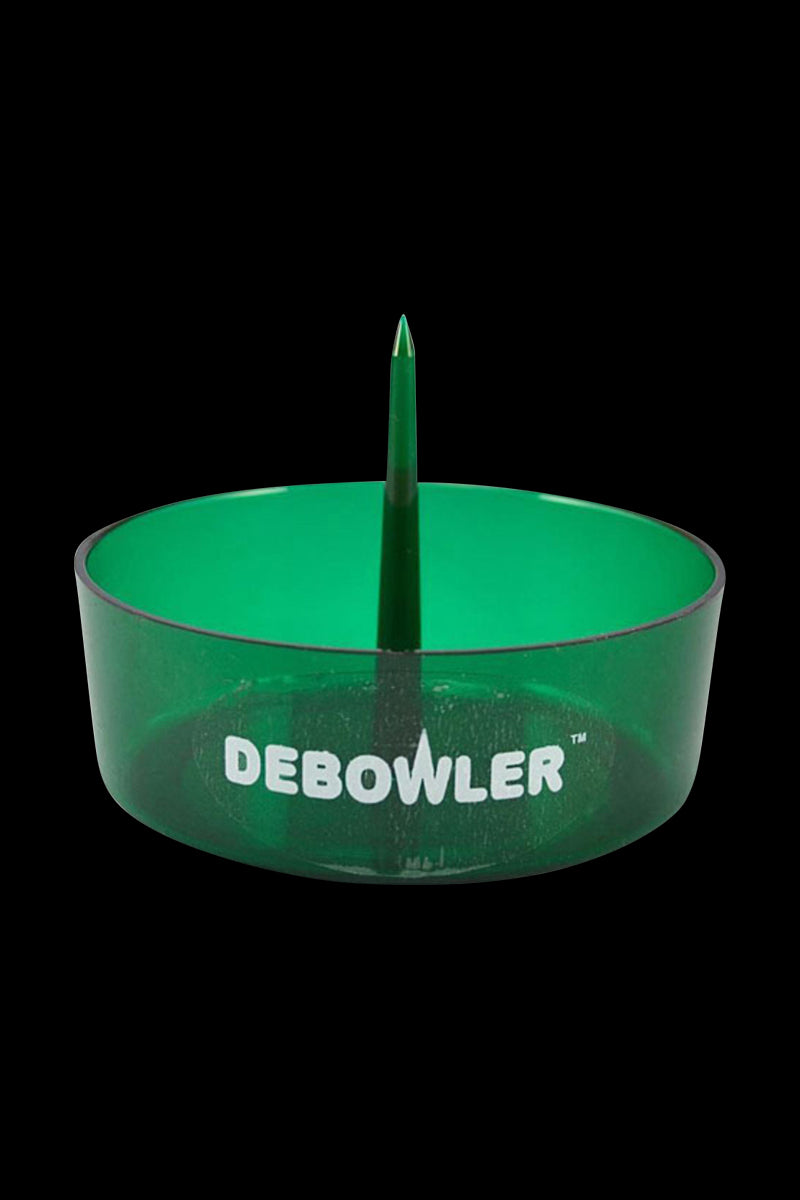 Front-facing view of the yellow Debowler Ashtray showing its round bowl and central spike against a black background.