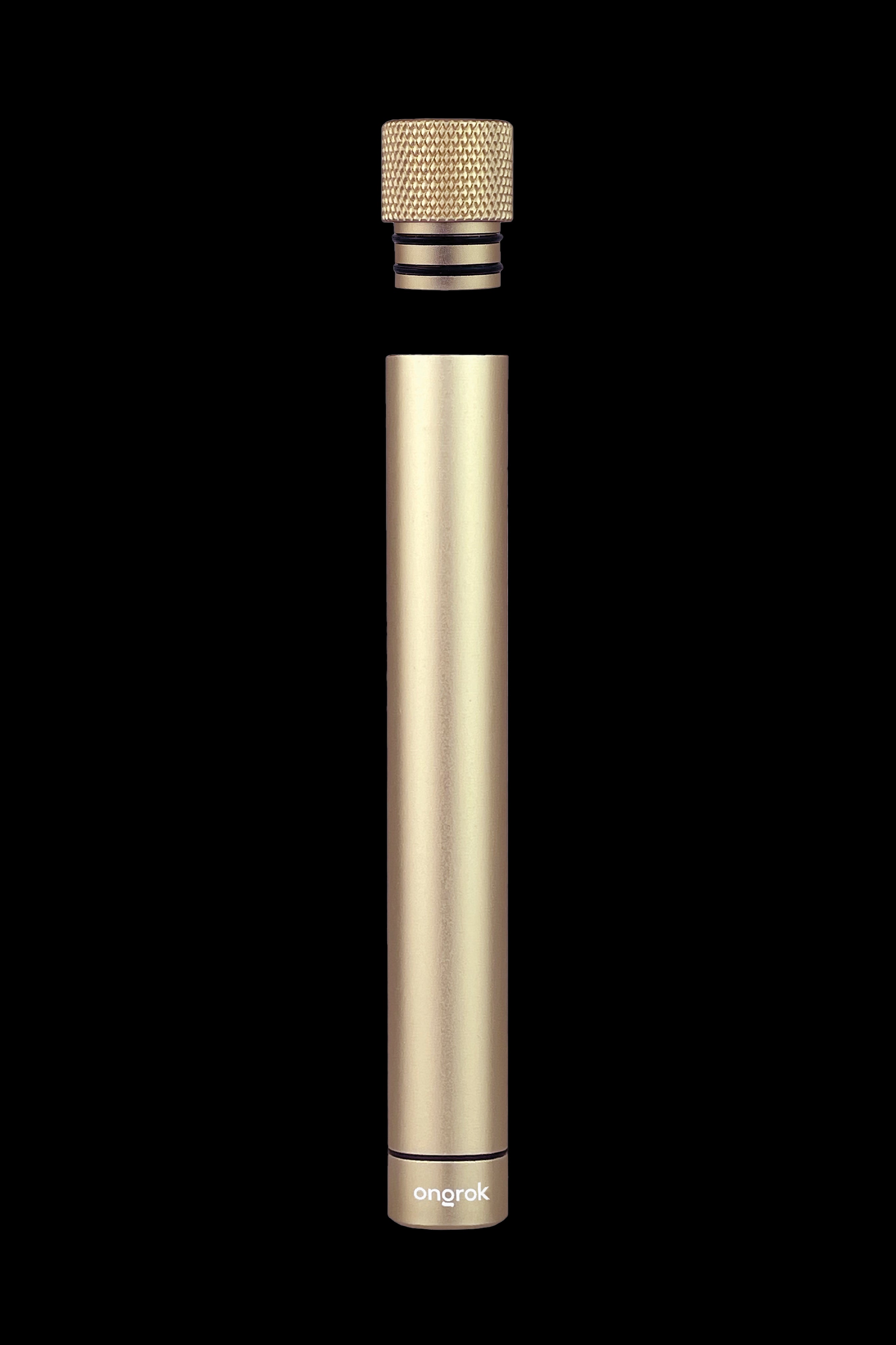 Gold cannabis oil applicator with textured grip.