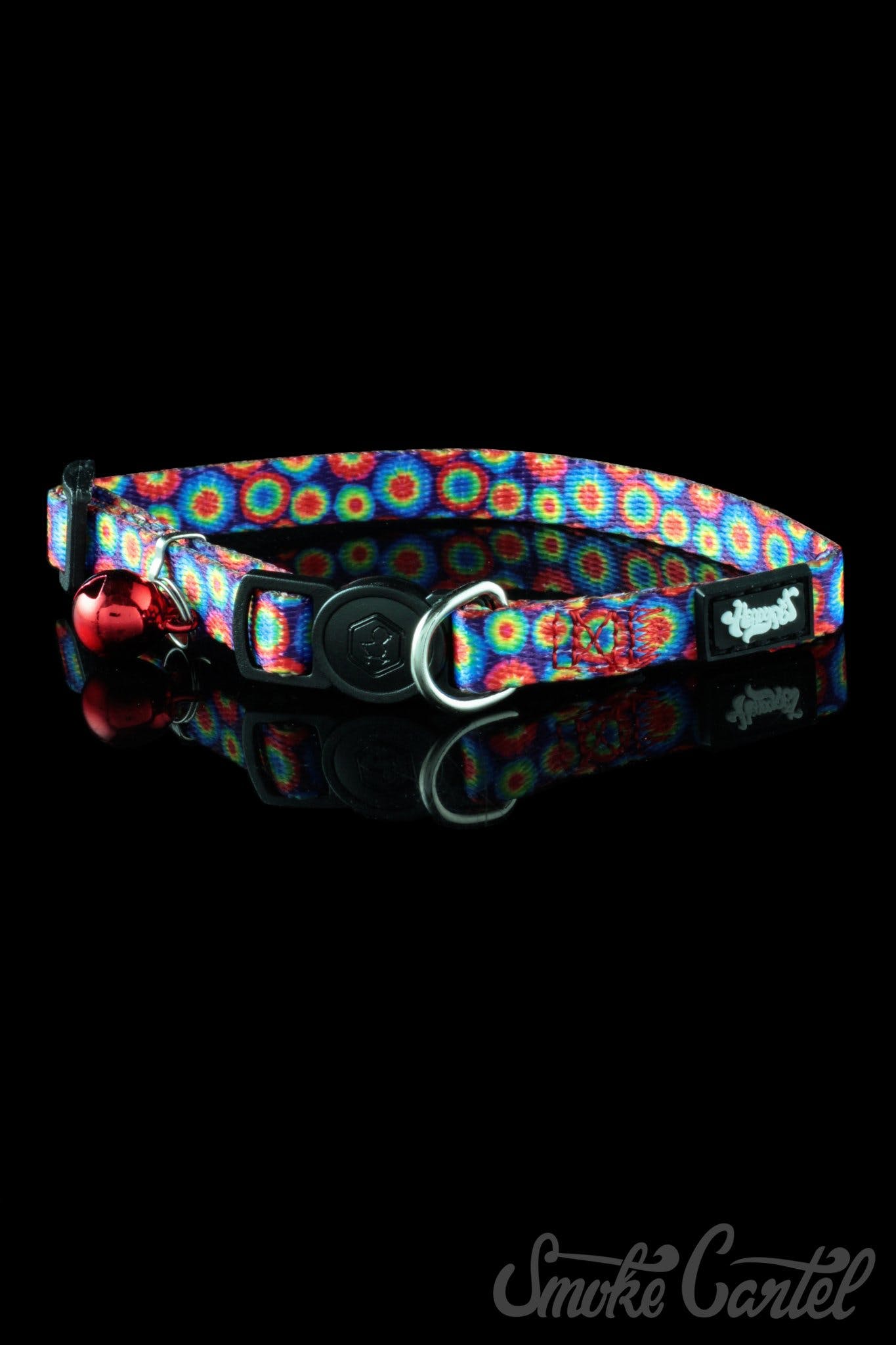 A close-up of the HeadyPet Cat Collar, featuring a vibrant, colorful pattern against a plain black backdrop.