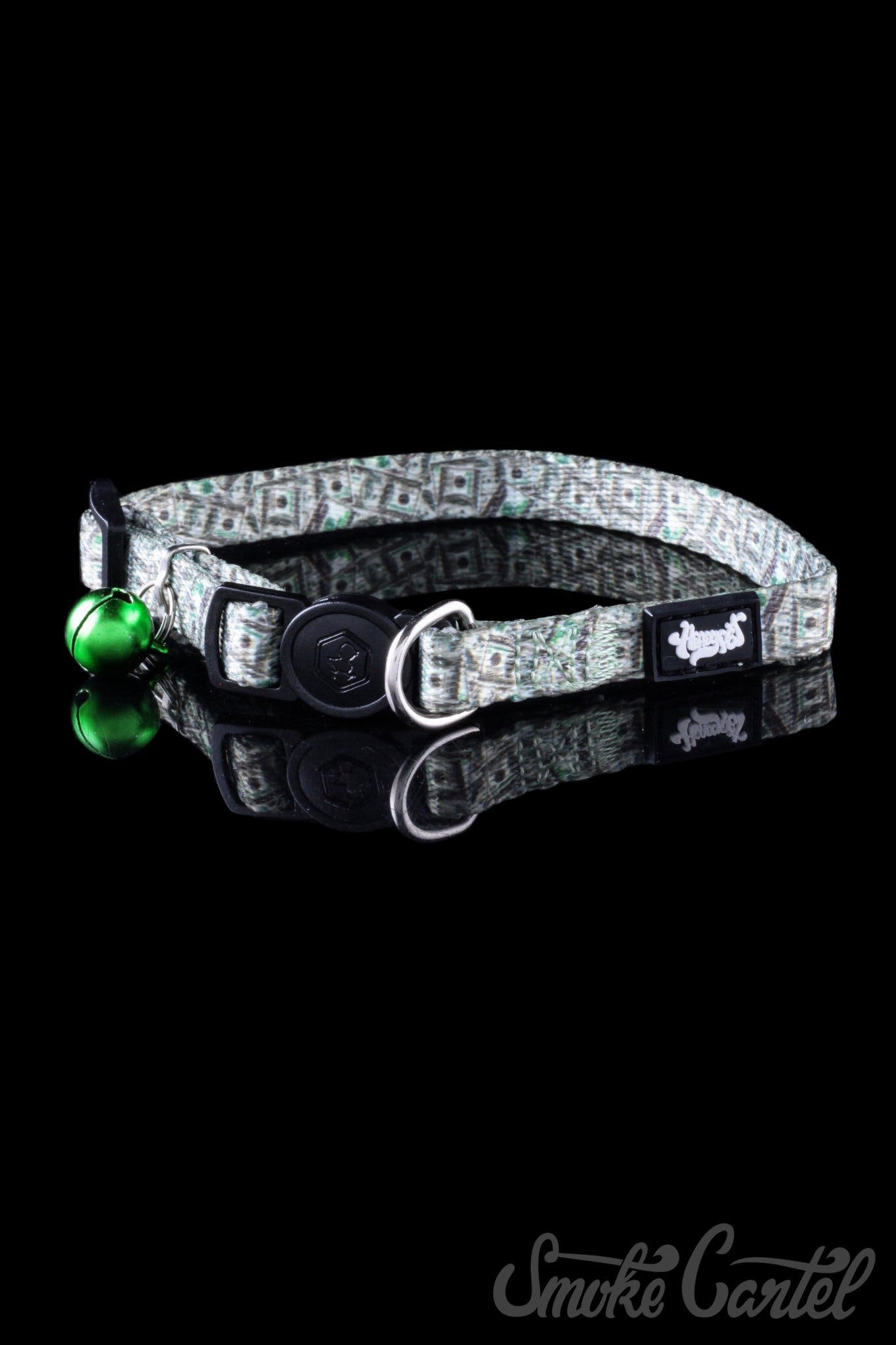 A close-up view of the HeadyPet Cat Collar, showcasing its patterned fabric design and adjustable buckle.