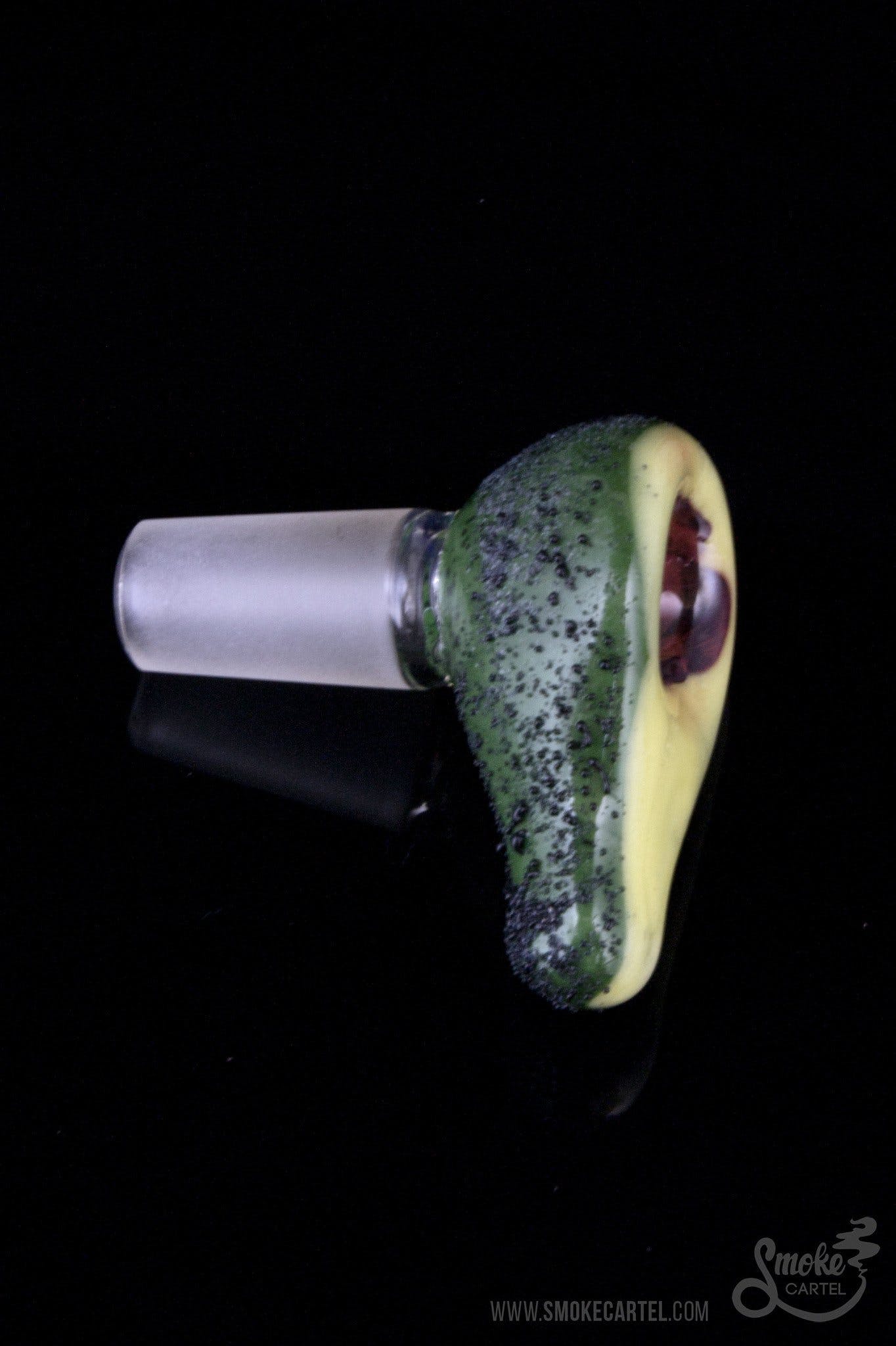 A close-up, angled view of the Empire Glassworks “Avocadope” Flower Bowl, showcasing its green, textured glass design.
