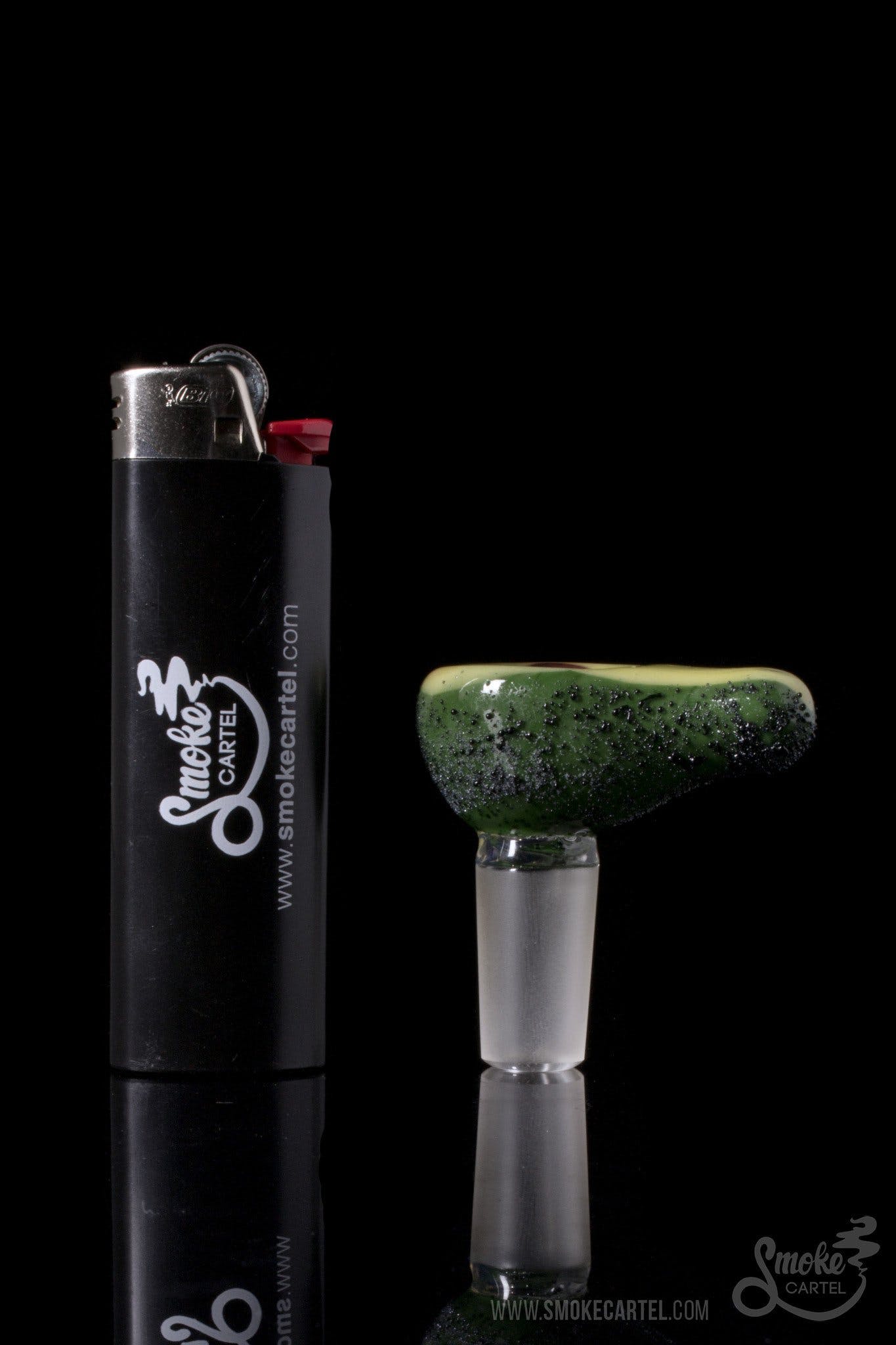 A studio shot of the Empire Glassworks "Avocadope" Flower Bowl, highlighting its vibrant green and unique sculpted design.