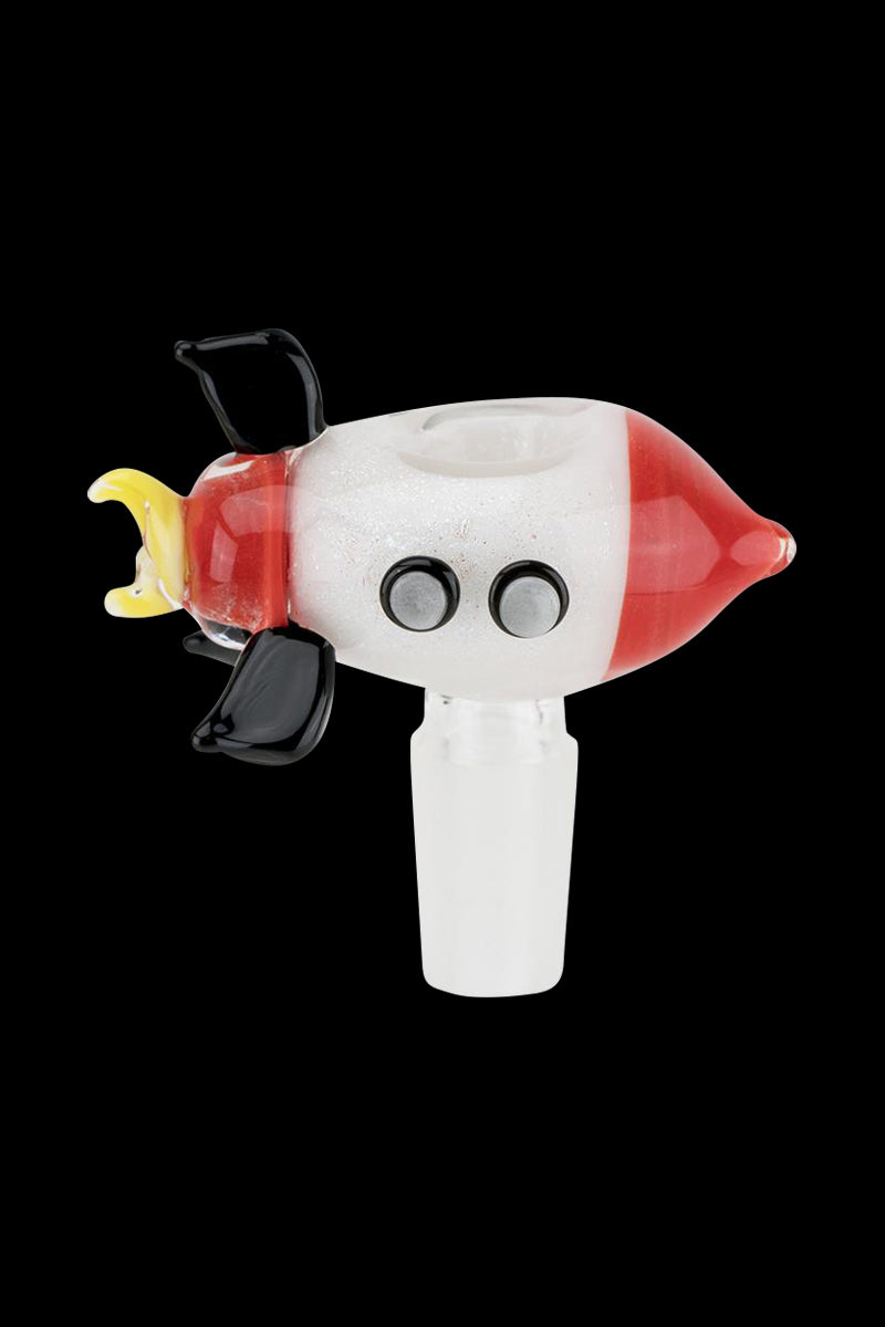 Front view of the Empire Glassworks Space Cruiser Glow In the Dark Bowl, a spaceship-shaped glass piece with a vibrant color scheme.