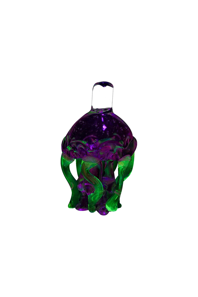 A vibrant, top-down view of the Empire Glassworks UV Jellyfish Carb Cap, showcasing its translucent, colorful design.