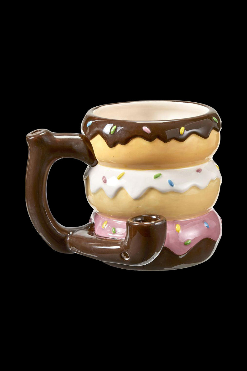 A side view of the Roast & Toast Donut Mug Pipe, resembling a glazed donut with a curved pipe extending from its side.