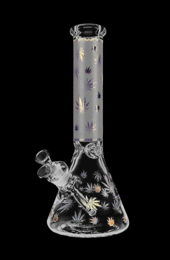 Front view of the Foil Canna-Leaf Print Beaker Bong, displaying a clear glass beaker with a leafy print design.