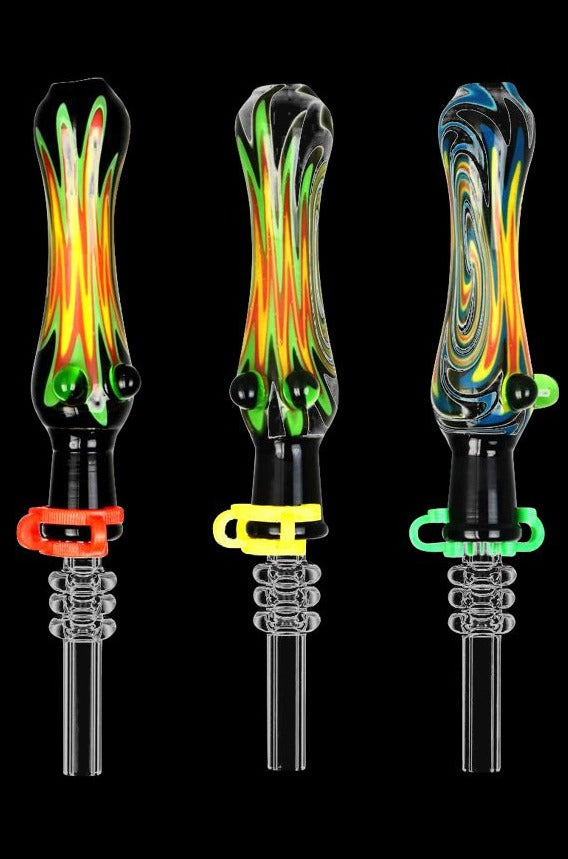 Front view of the Fully Worked Wig Wag Dab Straw with a transparent glass body and delicate, interwoven patterns.