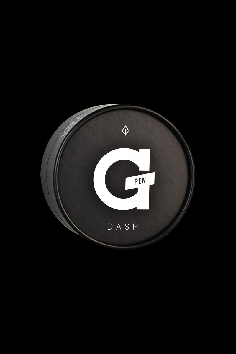 Top-down view of a round black tin labeled "G Pen Dash" against a black background, showing the bold white G Pen Dash logo centered on the lid.