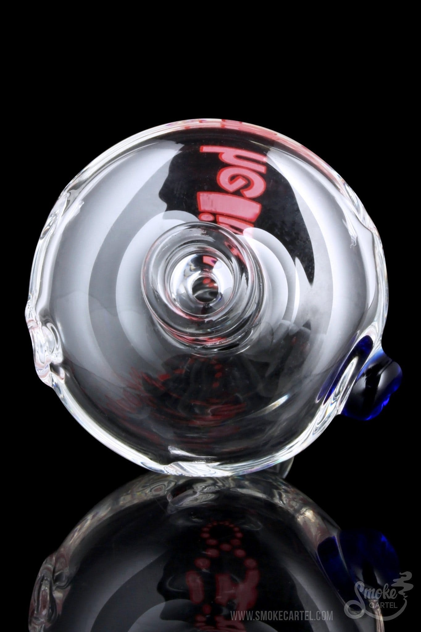 A close-up, angled view of the GRAV® Helix Taster Chillum, showcasing its clear glass construction and streamlined design.