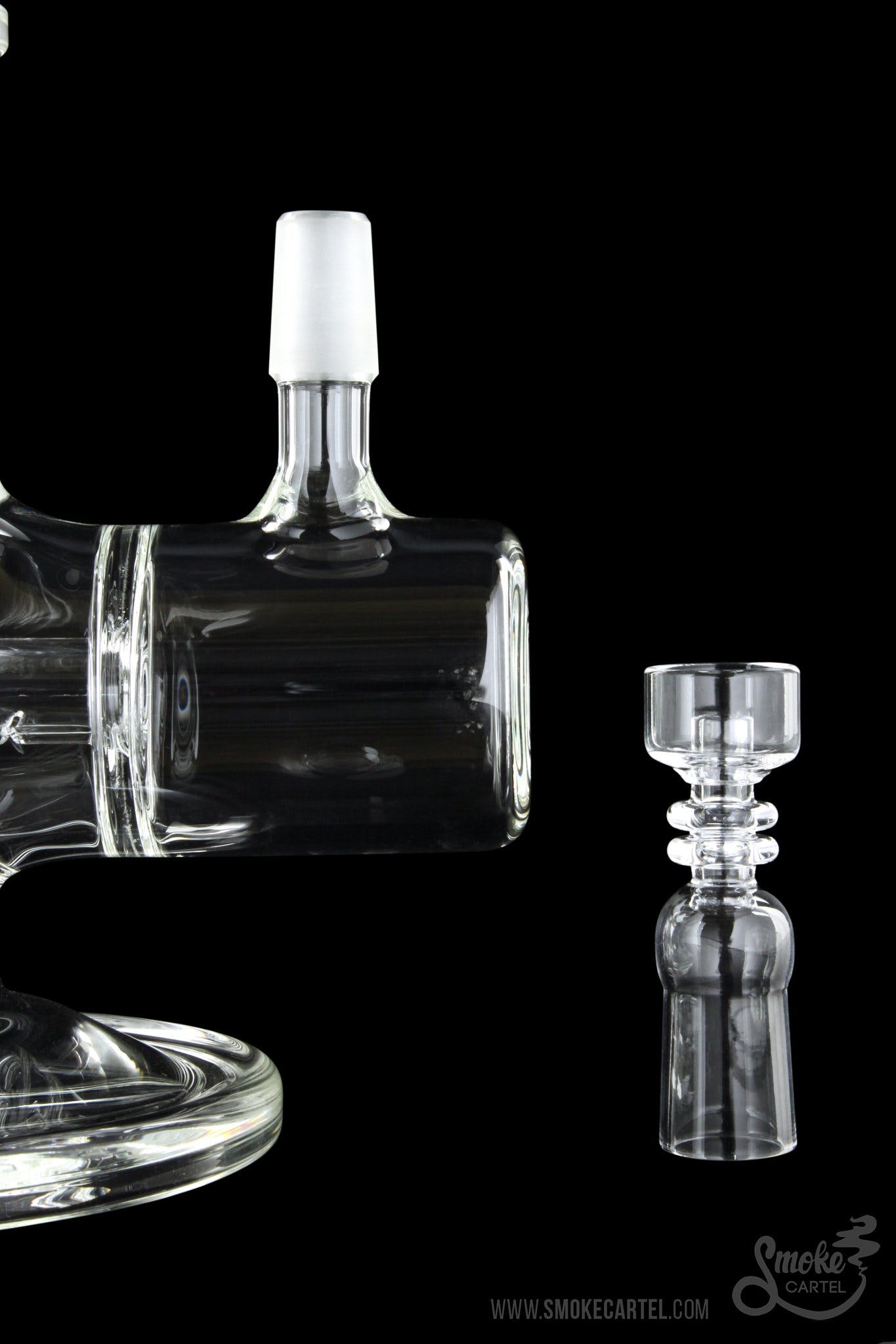 A studio shot of the GRAV® STAX Dual Action Inline Base, displaying its clear glass construction and stacked modular design.