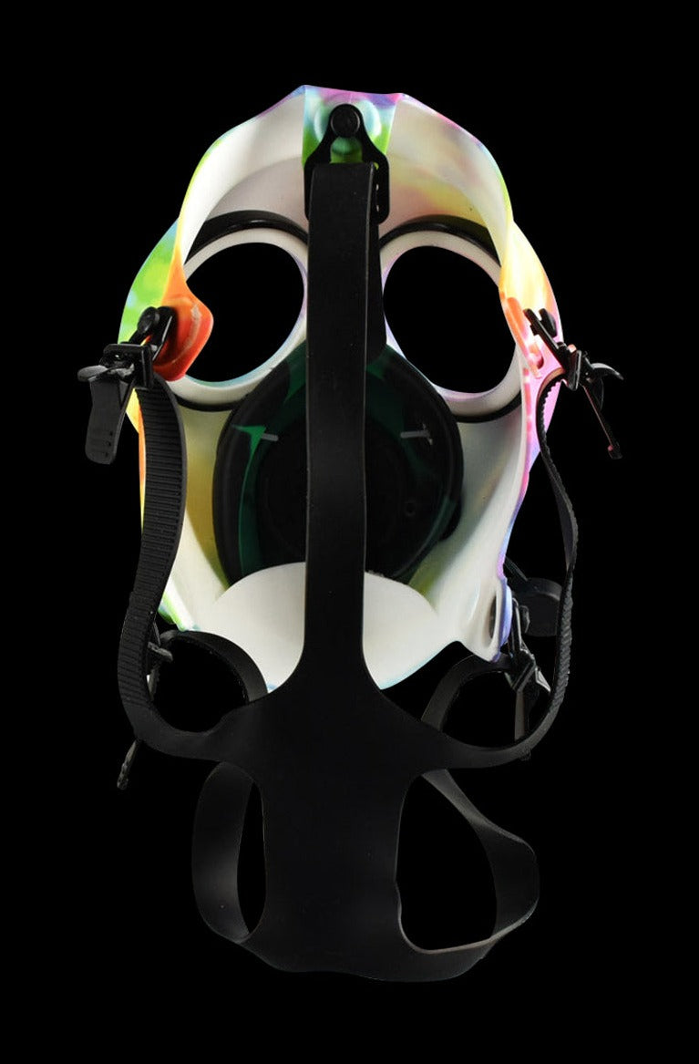 Front-facing view of the Gas Mask with Acrylic Bong in a tie dye finish, shown against a black background with visible straps and circular eye openings.