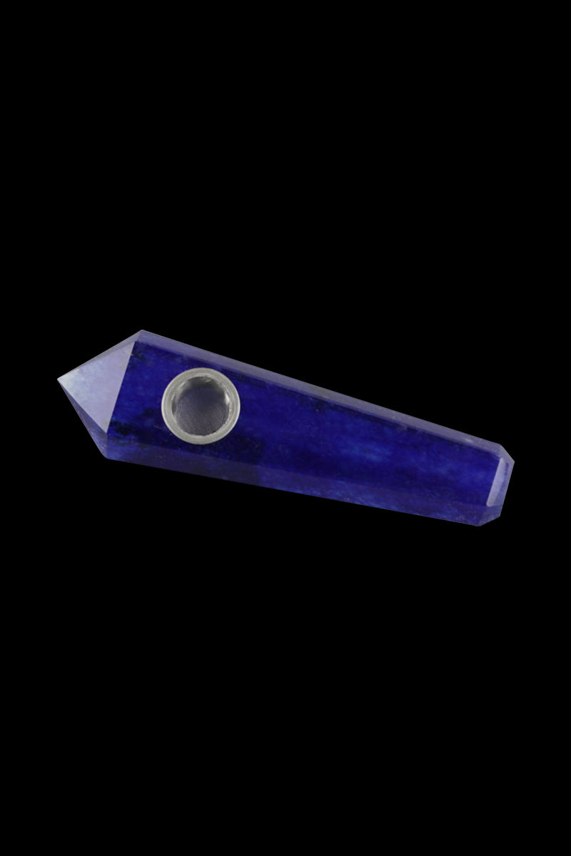 Angled close-up of the Natural Gemstone Mineral Hand Pipe in blue crystal against a black background, showing its faceted point and bowl.