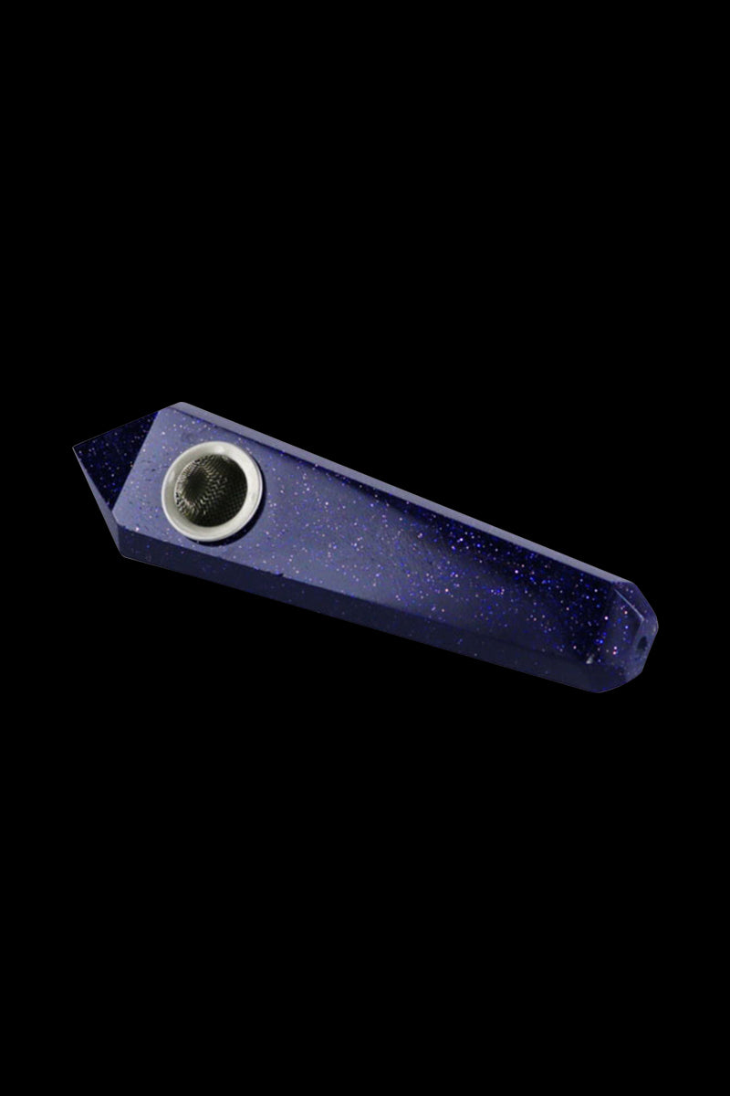 Angled close-up of a Blue Goldstone Natural Gemstone Mineral Hand Pipe against a black background, showing its faceted, glittering deep-blue surface and metal bowl.