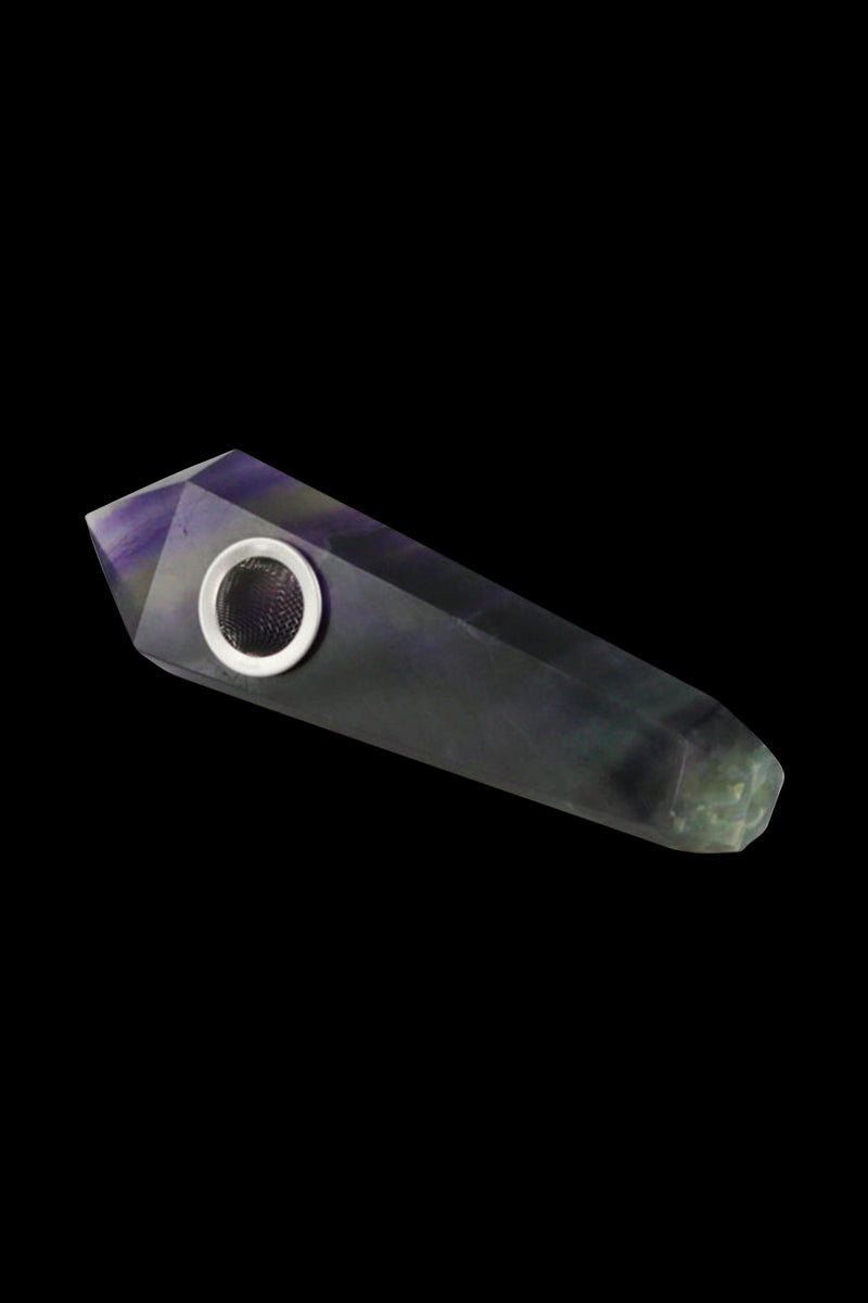 Angled close-up of a faceted Natural Gemstone Mineral Hand Pipe in white-turquoise tones against a black background.