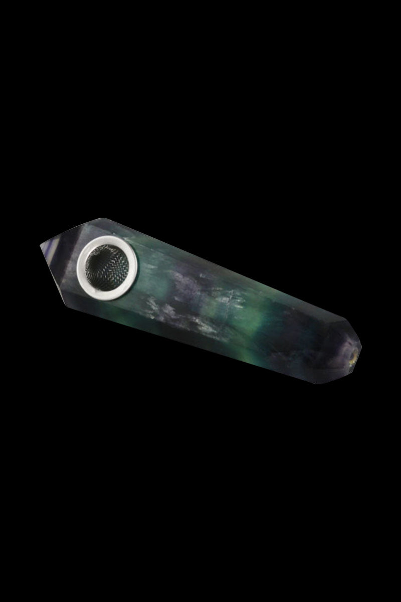 Angled close-up of the Natural Gemstone Mineral Hand Pipe showing a faceted quartz body with green and purple tones and a metal bowl rim.