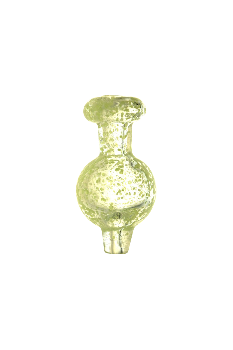 A slightly angled close-up of the Glow in the Dark Speckled Ball Carb Cap, displaying its speckled pattern and rounded shape.
