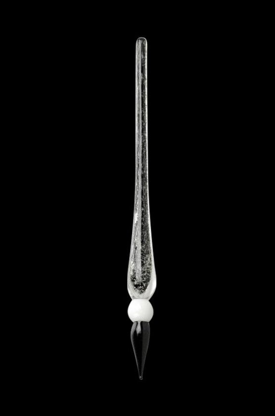 Centered vertical studio shot of the Glow in the Dark Dabber Tool showing its elongated glass shaft, white bead accent, and tapered tip against a black background