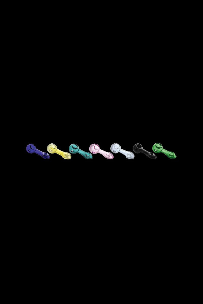 Row of seven GRAV® Mini Spoon Pipe hand pipes in blue, yellow, teal, pink, clear, black, and green on a black background.