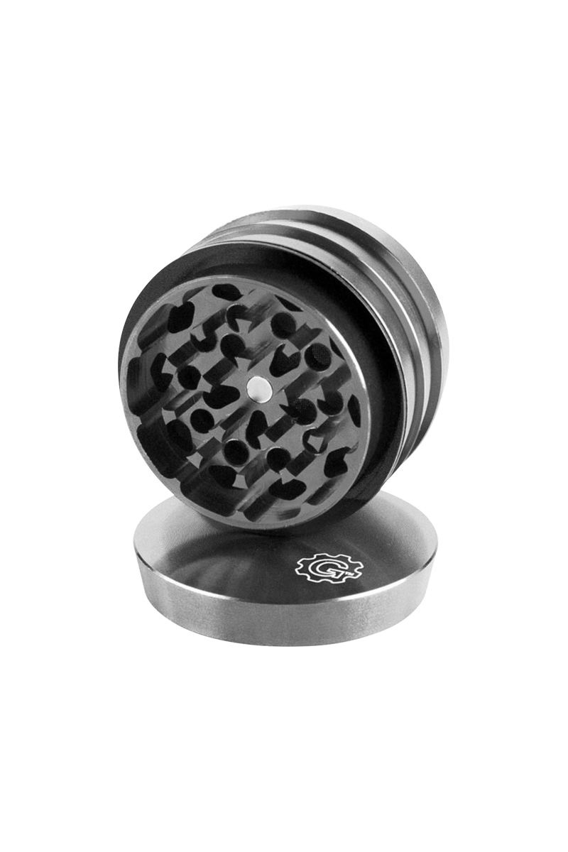 A high-angle view of the Pulsar 2 Aluminum Tiered 4pc Grinder, showcasing its tiered design and metallic finish.