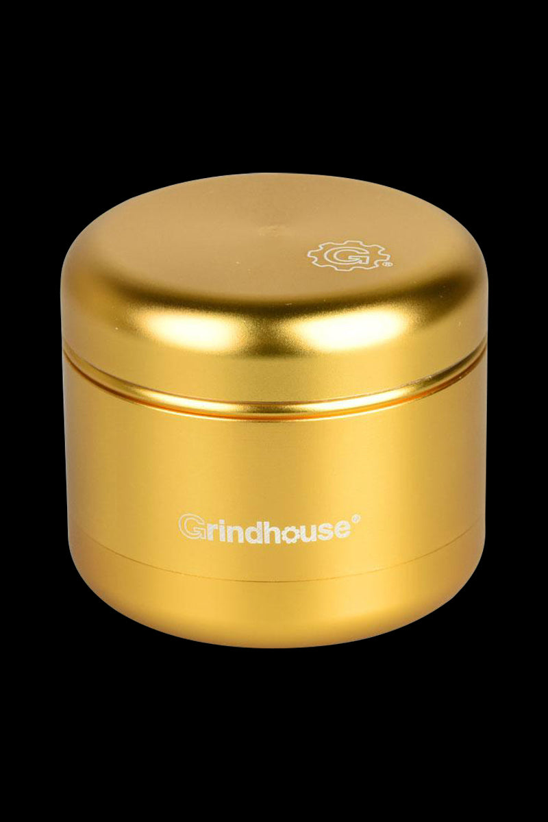 Front view of the Pulsar Matte Grinder - 4 Piece, showcasing its metallic finish and compact, cylindrical shape.